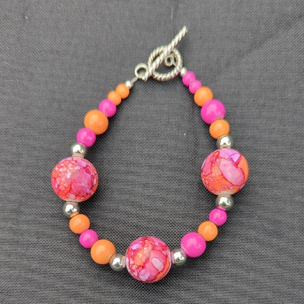 Vibrant Pink and Orange Beaded Bracelets